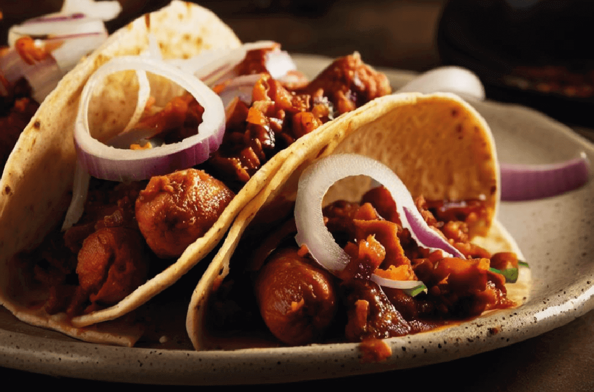 Tacos de chorizo y cebolla